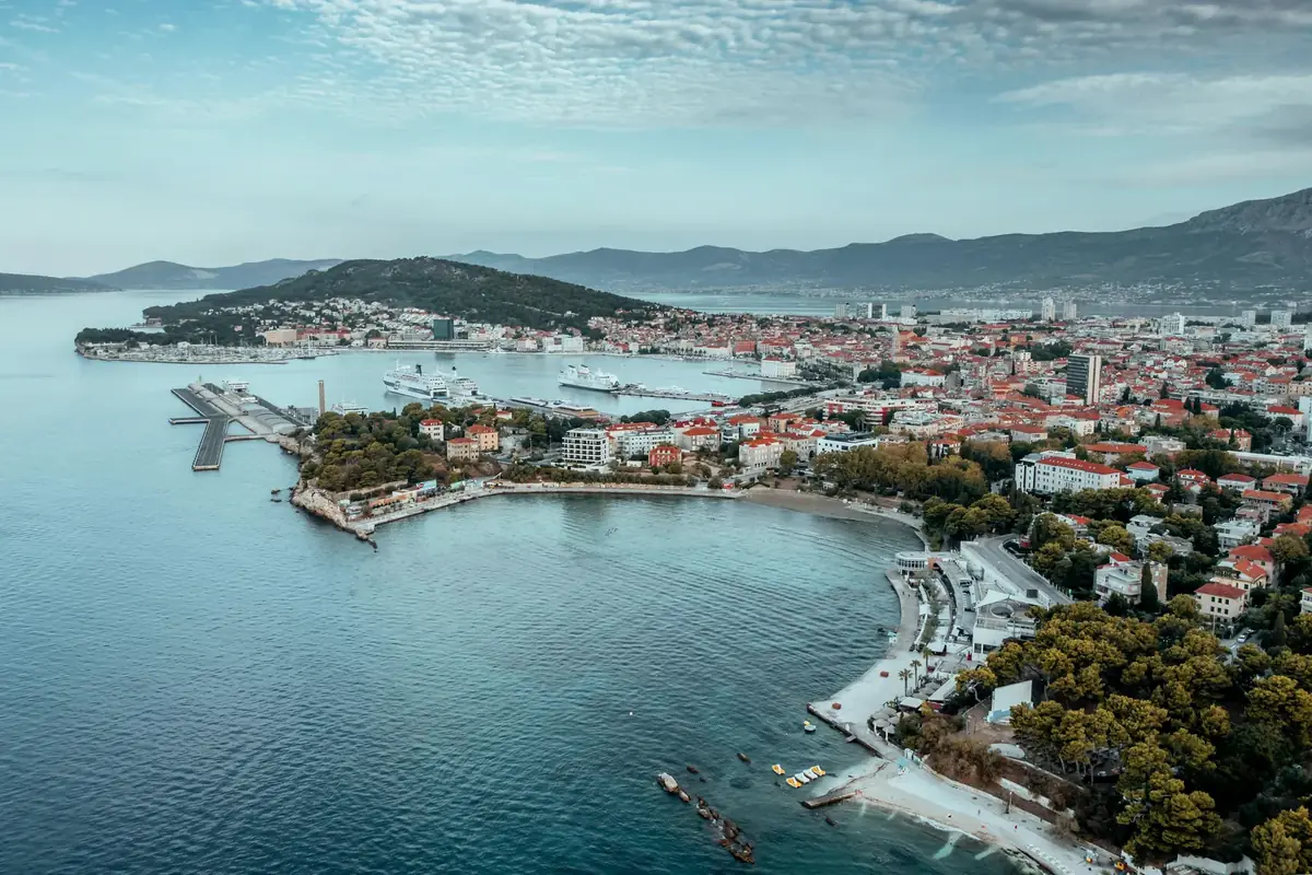 Aerial view of Split's waterfront, harbour and city with Marjan hill behind